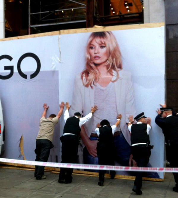 Kate Moss billboard injures shoppers